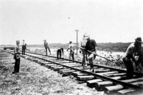 Laying Track Outside Homestead