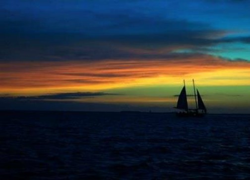 Sailboat Sailing into a Key West Sunset Rainbow
